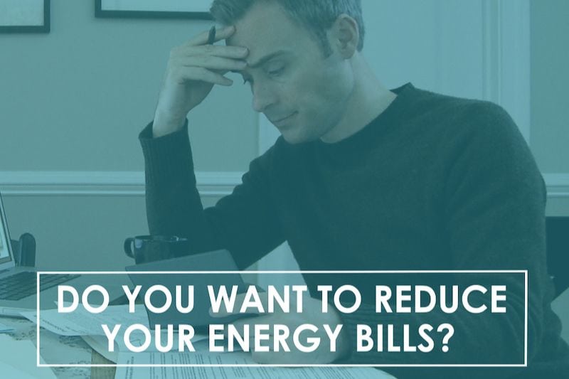 Video - Do You Want to Reduce Your Energy Bills? Image is a title page with a man sitting at a table reviewing papers.